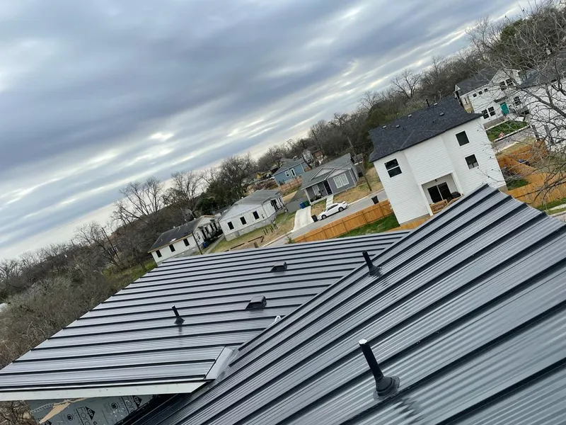 Standing seam metal roof panels with vents for Skylight Repair in West Point